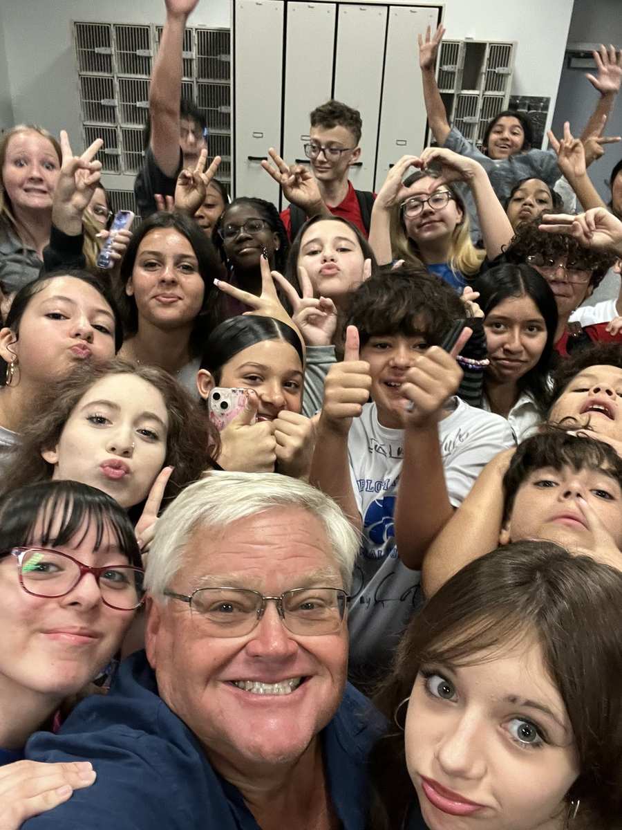 Mark Dahlberg celebrating with an enthusiastic group of students from his Florida school music program